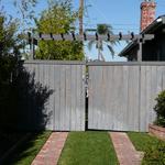 The concrete drive path has been replaced with brick and the gate rebuilt in the "craftsman" style of the house.