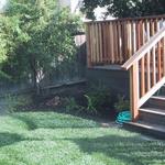 Now complete, the deck looks over a rejuvinated rear yard with new plantings and sod on a automated irrigation system.