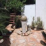 Put together nicely now, this quiet space is viewed out of a double glass door. The fountains attaract hummingbirds and the sound of the cascading water is enchanting.