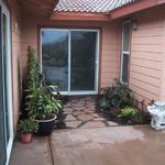 The exit from the master bedroom area paths through a small shaded garden.